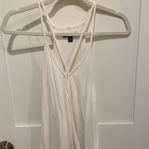 Women’s white tank top with cross V neck line